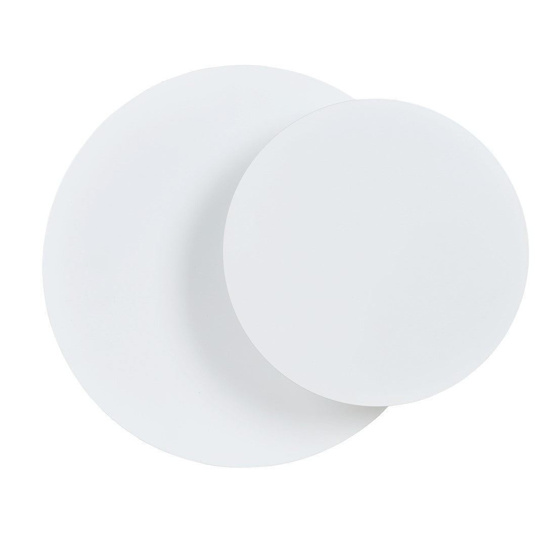Vue de trois quarts du luminaire blanc, deux disques superposés sur fond blanc.