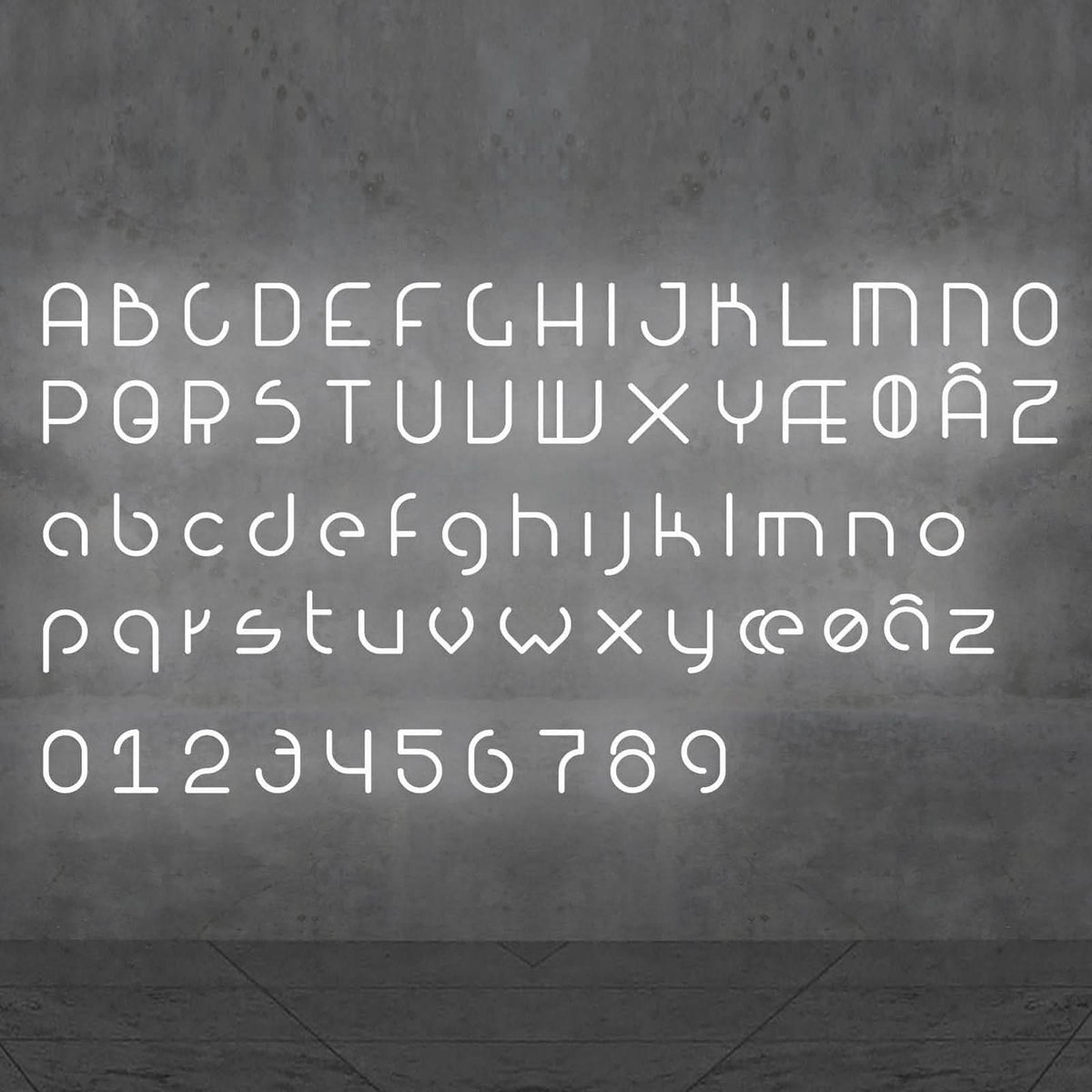 Alphabet complet en lettres et chiffres lumineux blancs sur fond gris
