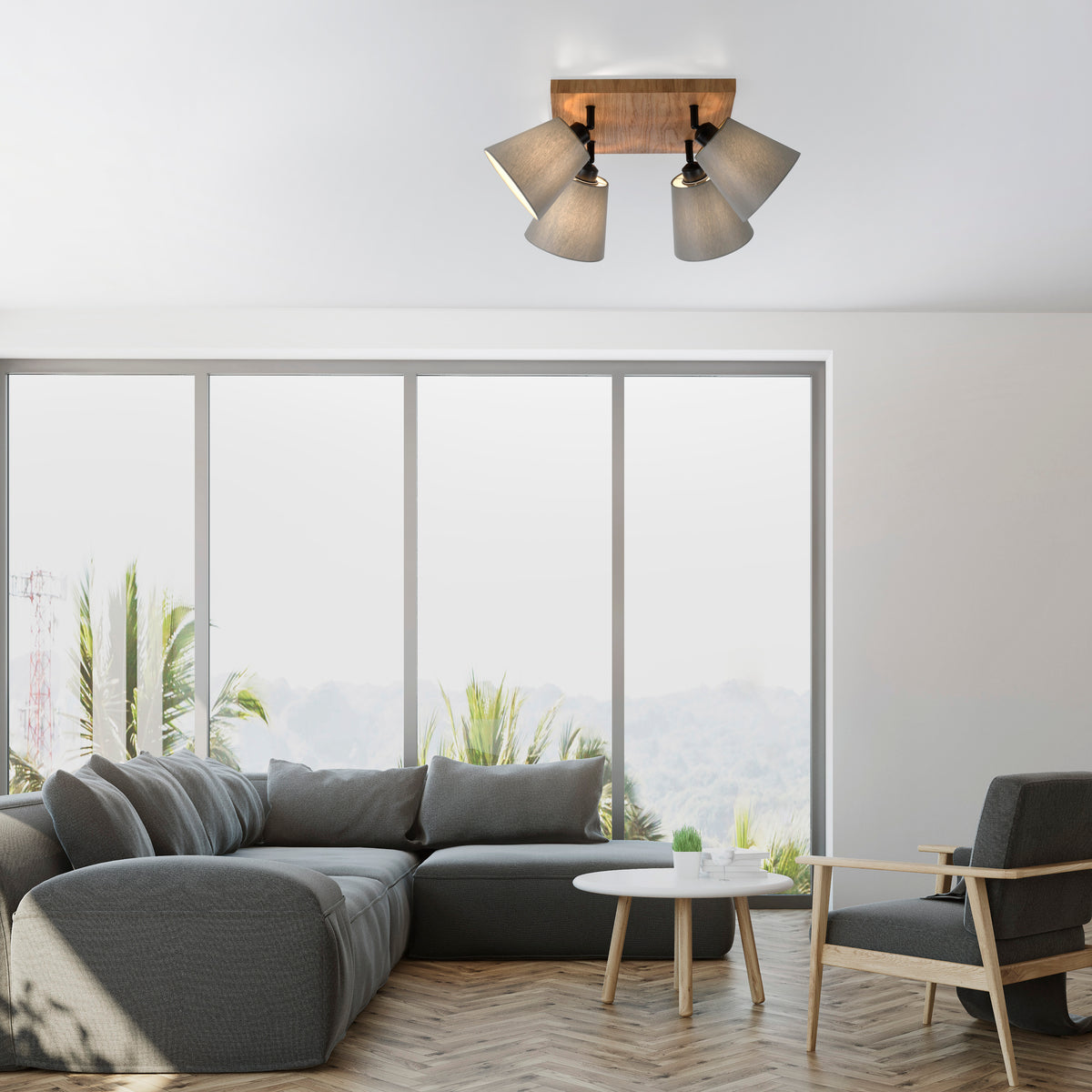 Mise en ambiance du plafonnier installé au plafond dans un salon contemporain lumineux.