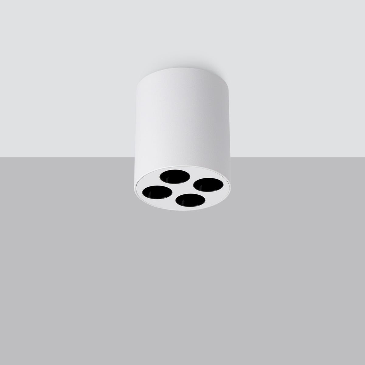 Plafonnier blanc installé au plafond sur fond gris clair