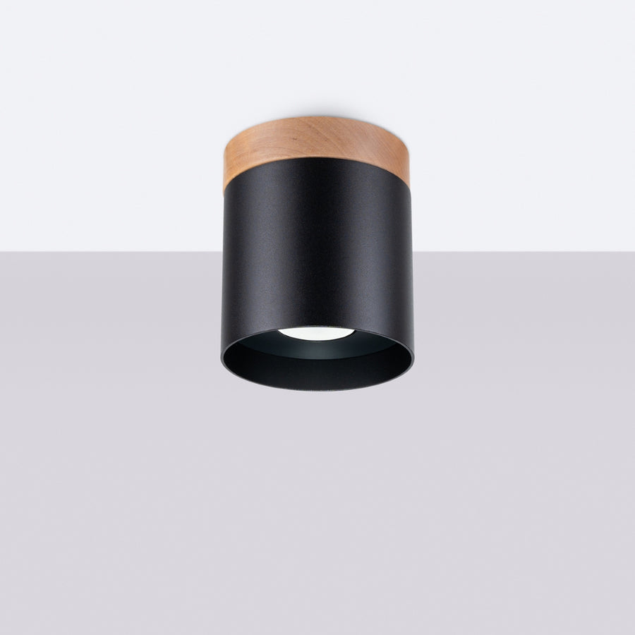 Vue de trois quarts du luminaire noir sur fond blanc