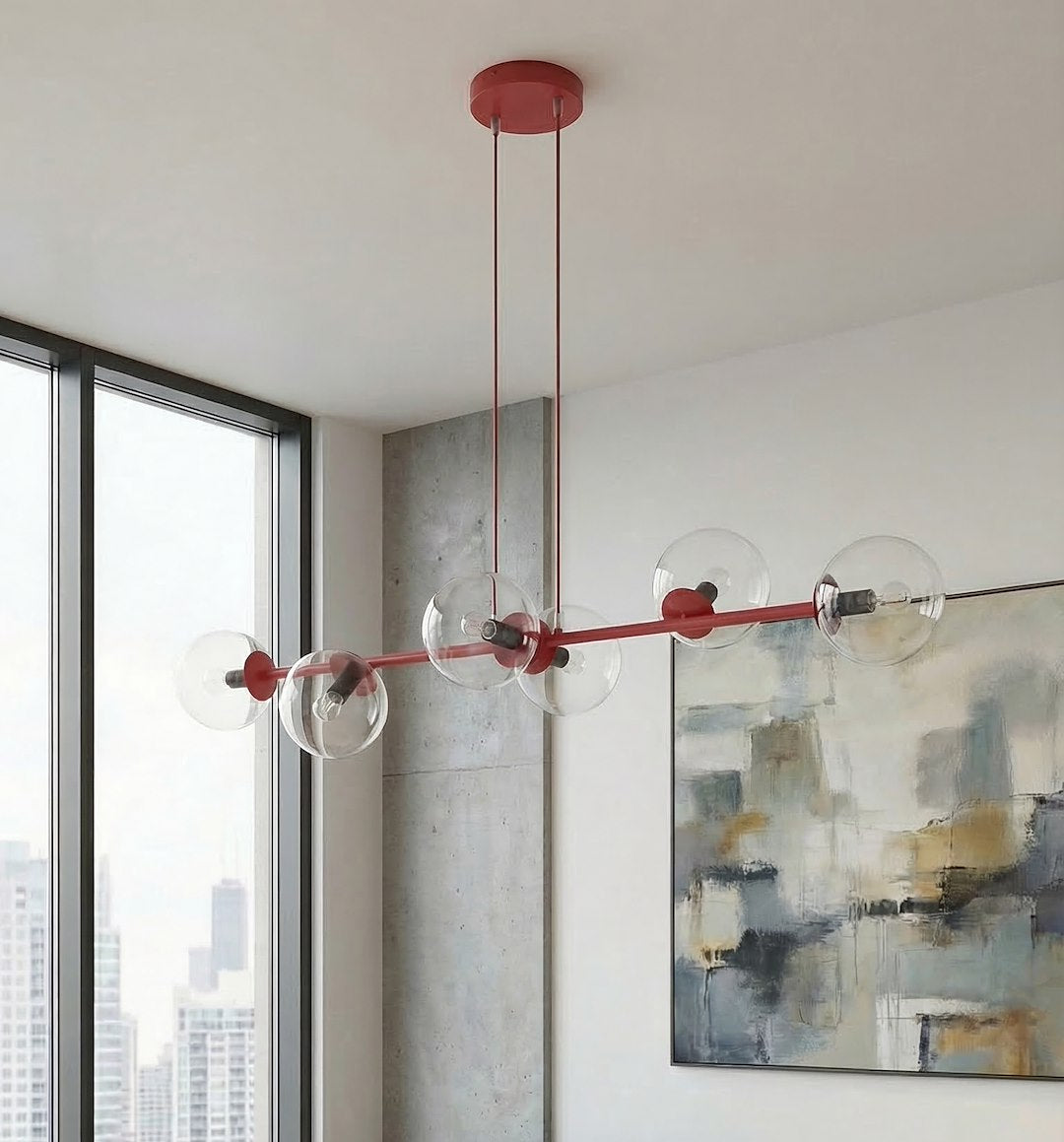 Vue en situation près d'une fenêtre, structure rouge et globes transparents