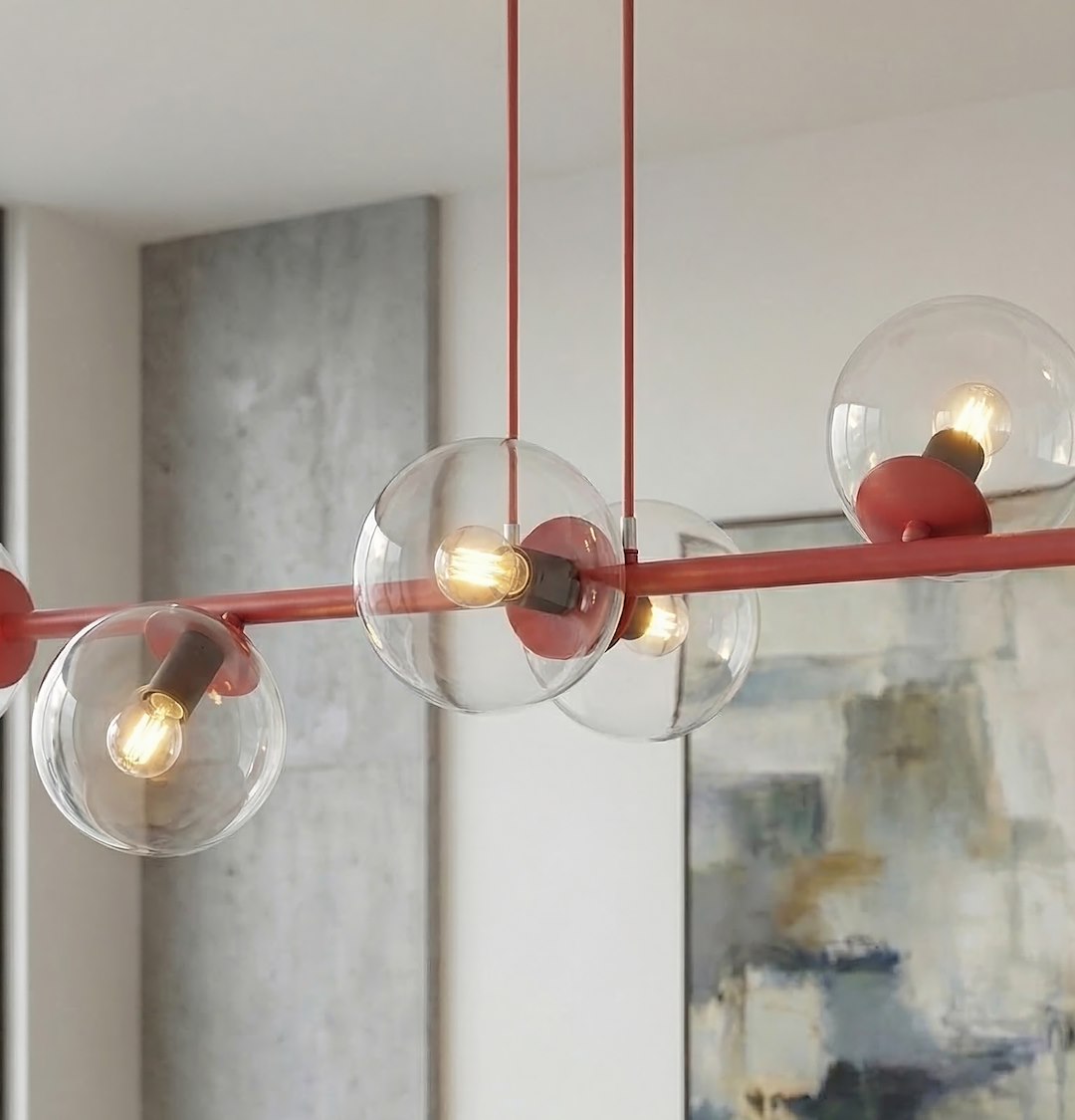 Détail rapproché des douilles rouges et globes transparents avec ampoules allumées