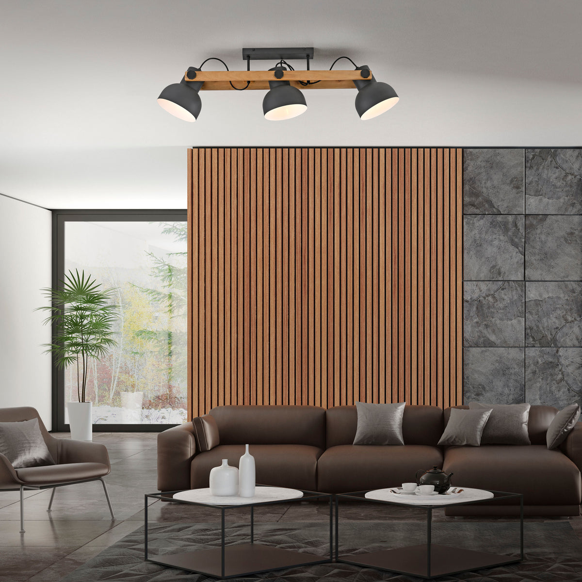 Mise en ambiance du plafonnier installé au plafond dans un salon au décor moderne.