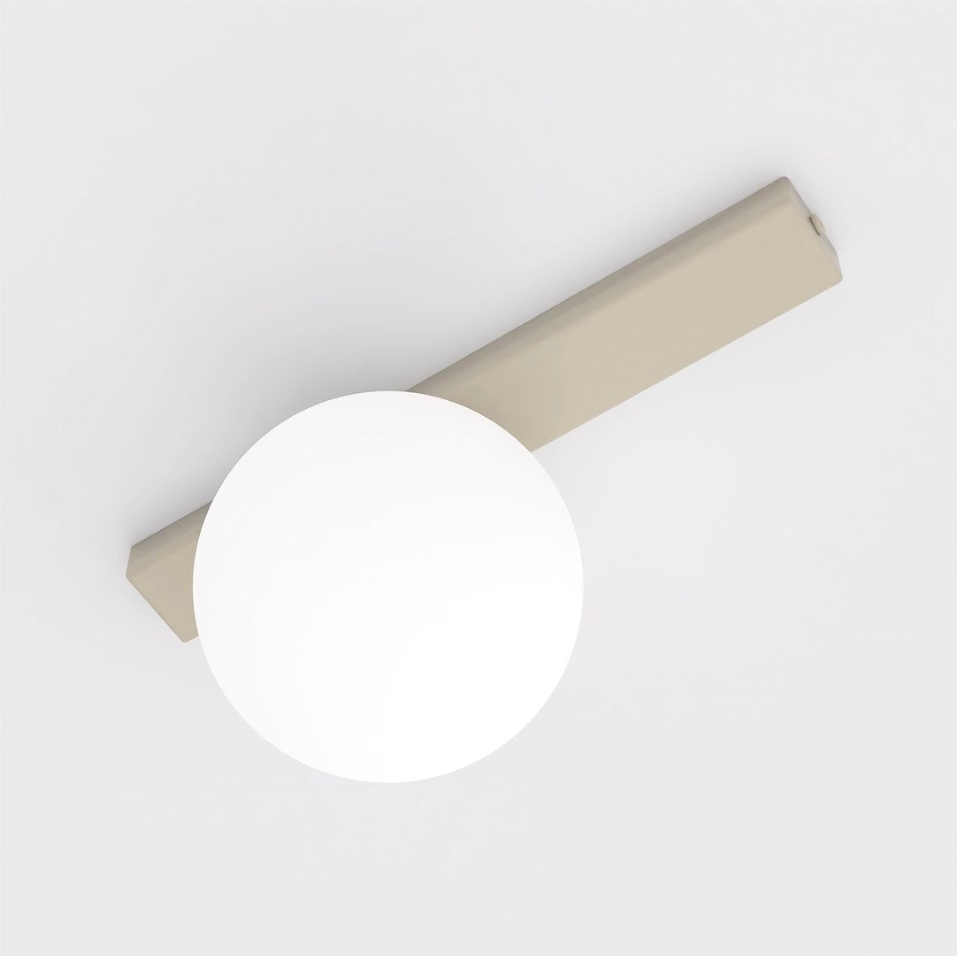 Vue en plongée montrant la barre métallique beige fixée au plafond