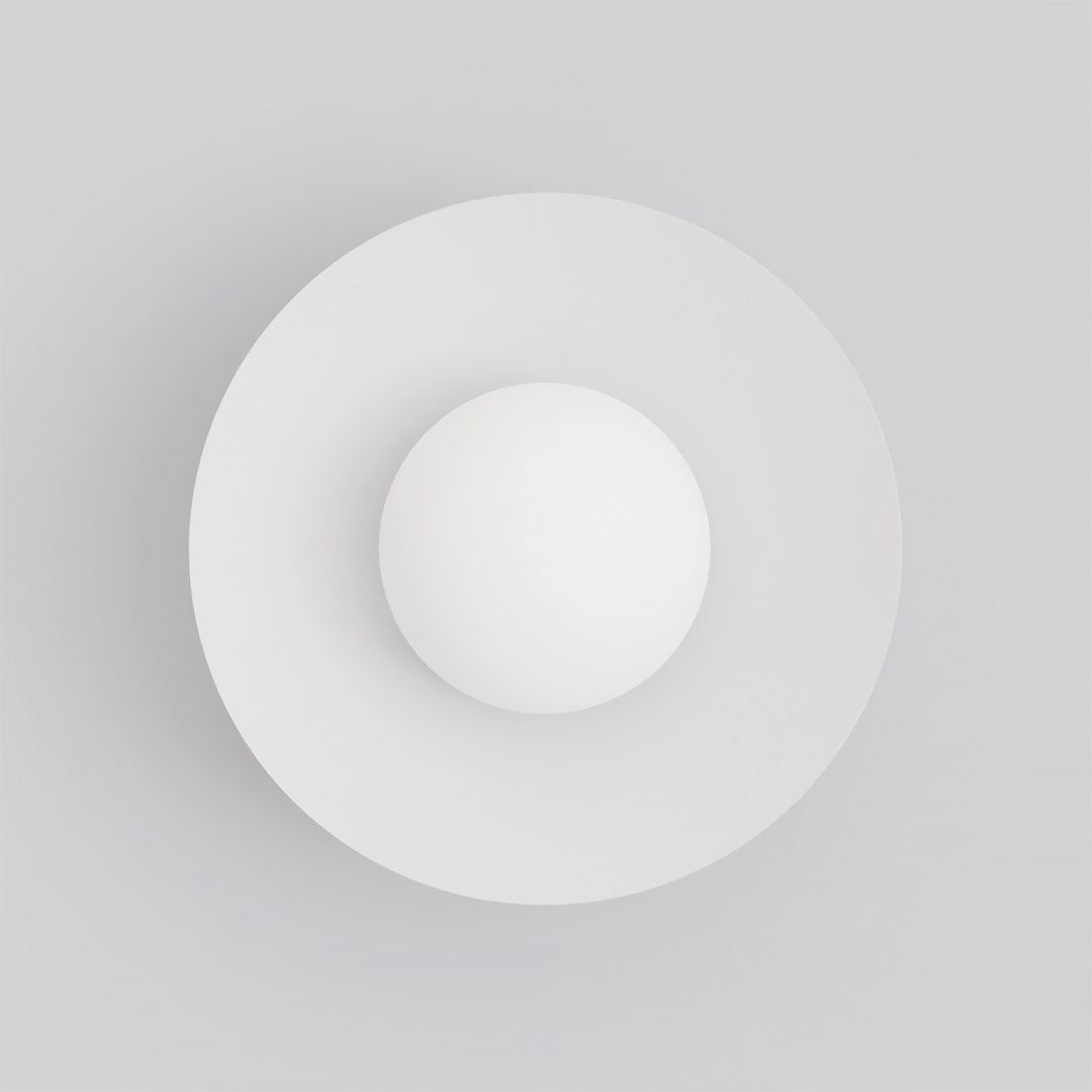 Vue de face montrant le disque conique blanc et la sphère centrale