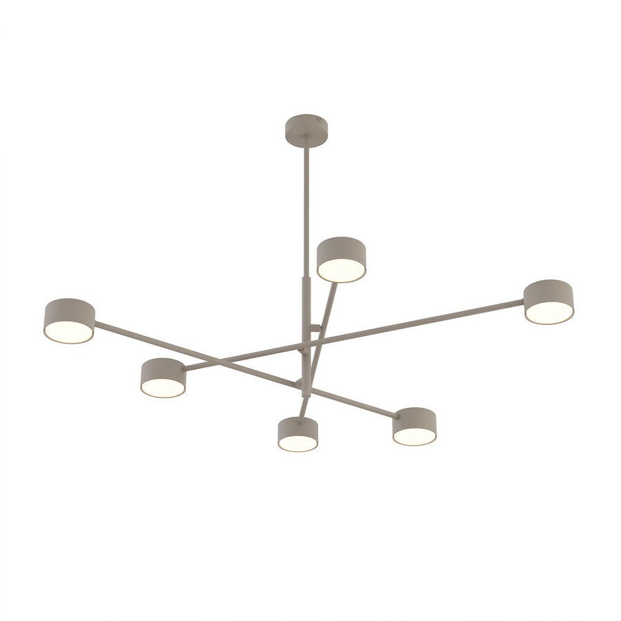 Vue de dessous du luminaire allumé, six diffuseurs ronds disposés en croix