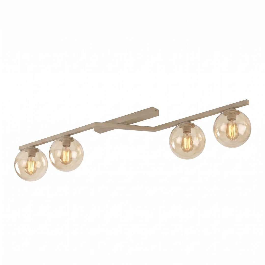 Plafonnier beige à quatre globes de verre ambré sur fond blanc