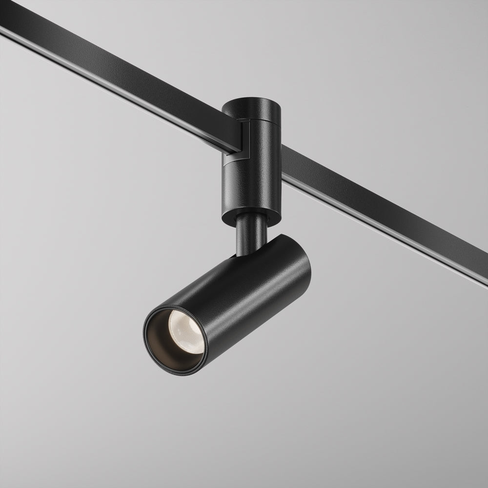 Spot noir de face fixé sur rail, tête cylindrique orientée vers le bas