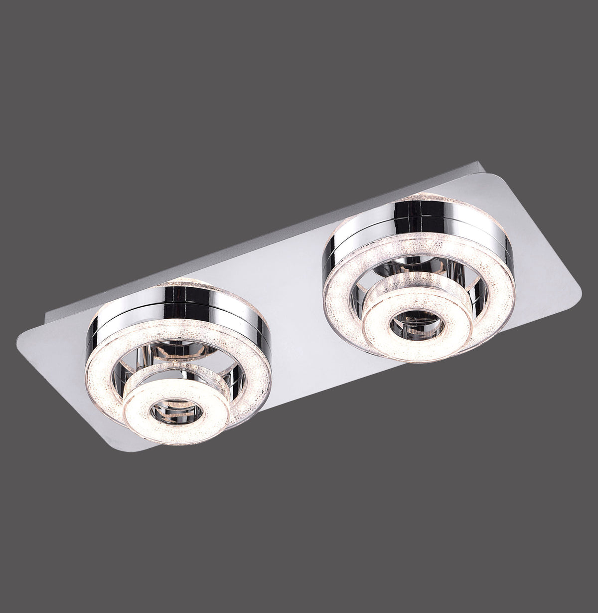 Plafonnier chromé à deux anneaux LED, vue de face sur fond gris