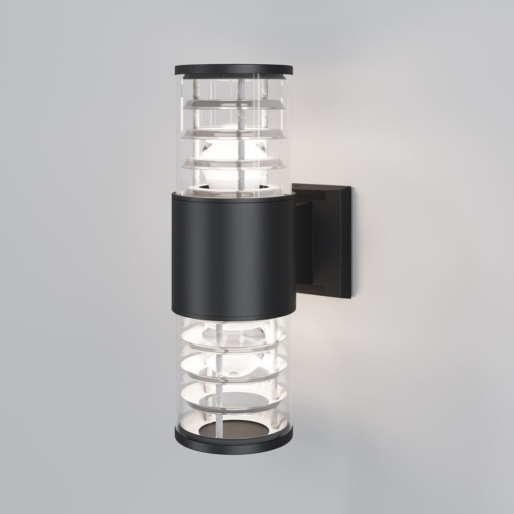 Applique murale noire de face, corps cylindrique et diffuseur en verre transparent