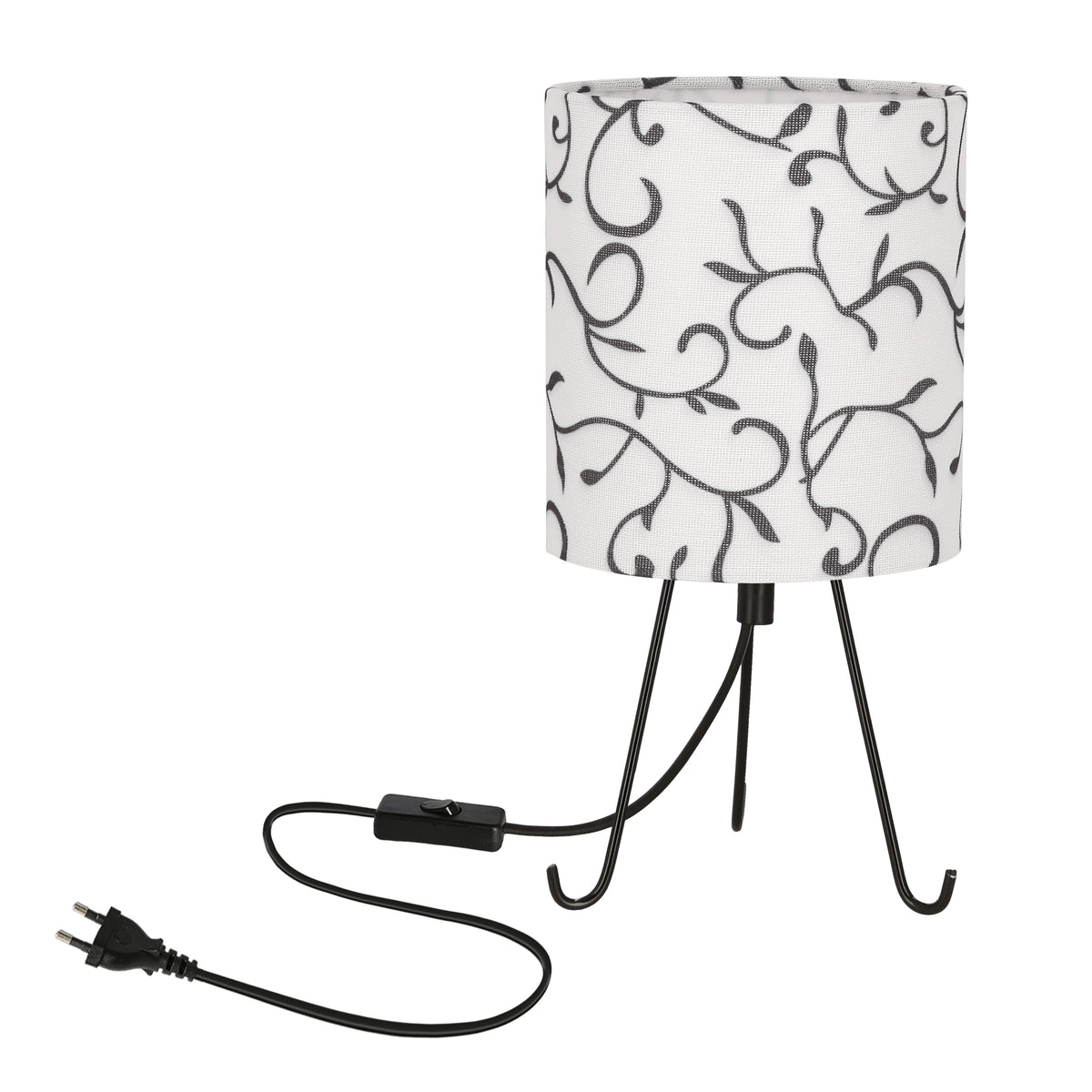 Vue produit : lampe à poser, abat-jour cylindrique blanc à motifs noirs et base trépied.