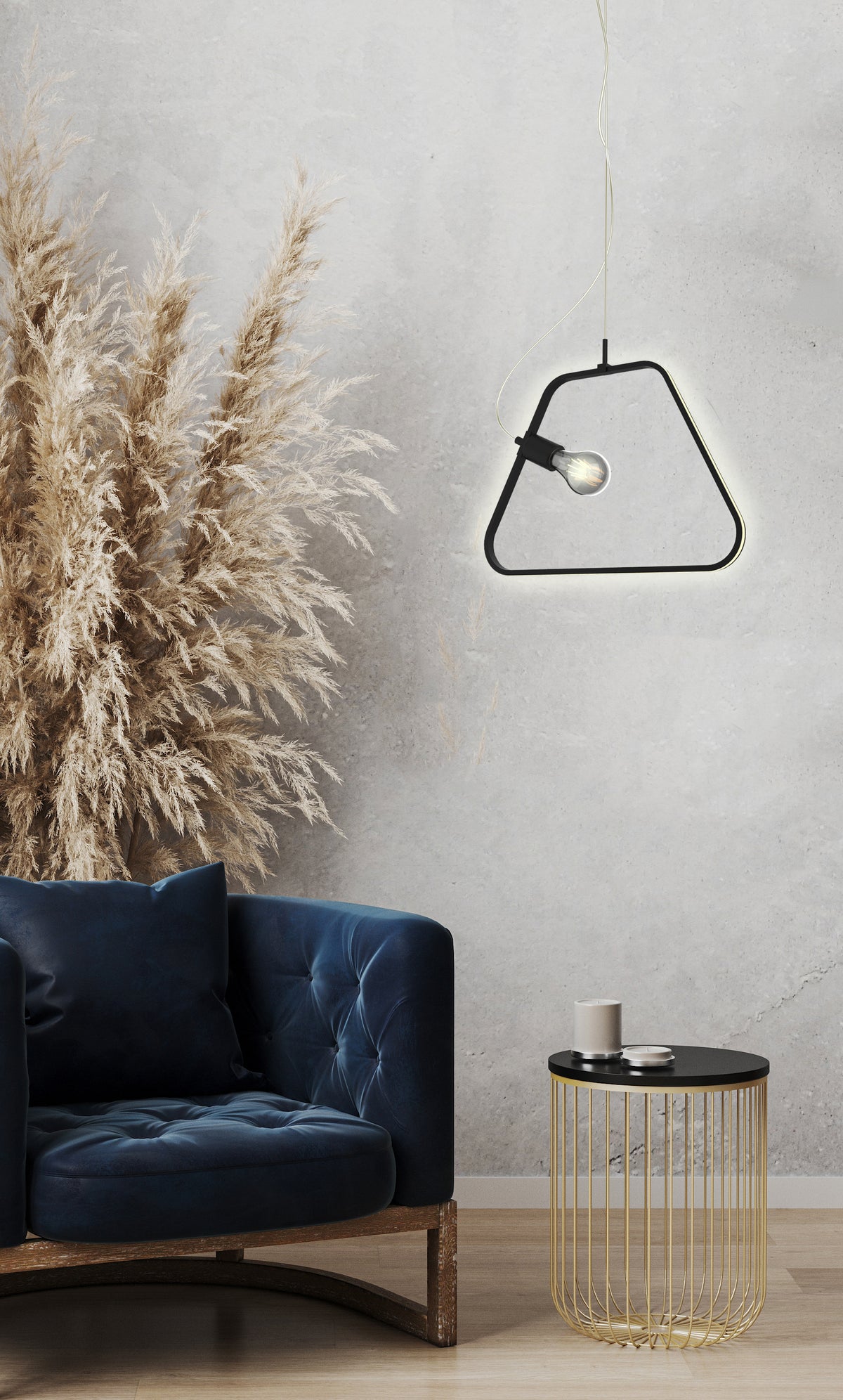 Mise en ambiance du salon avec suspension noire, fauteuil bleu et pampas