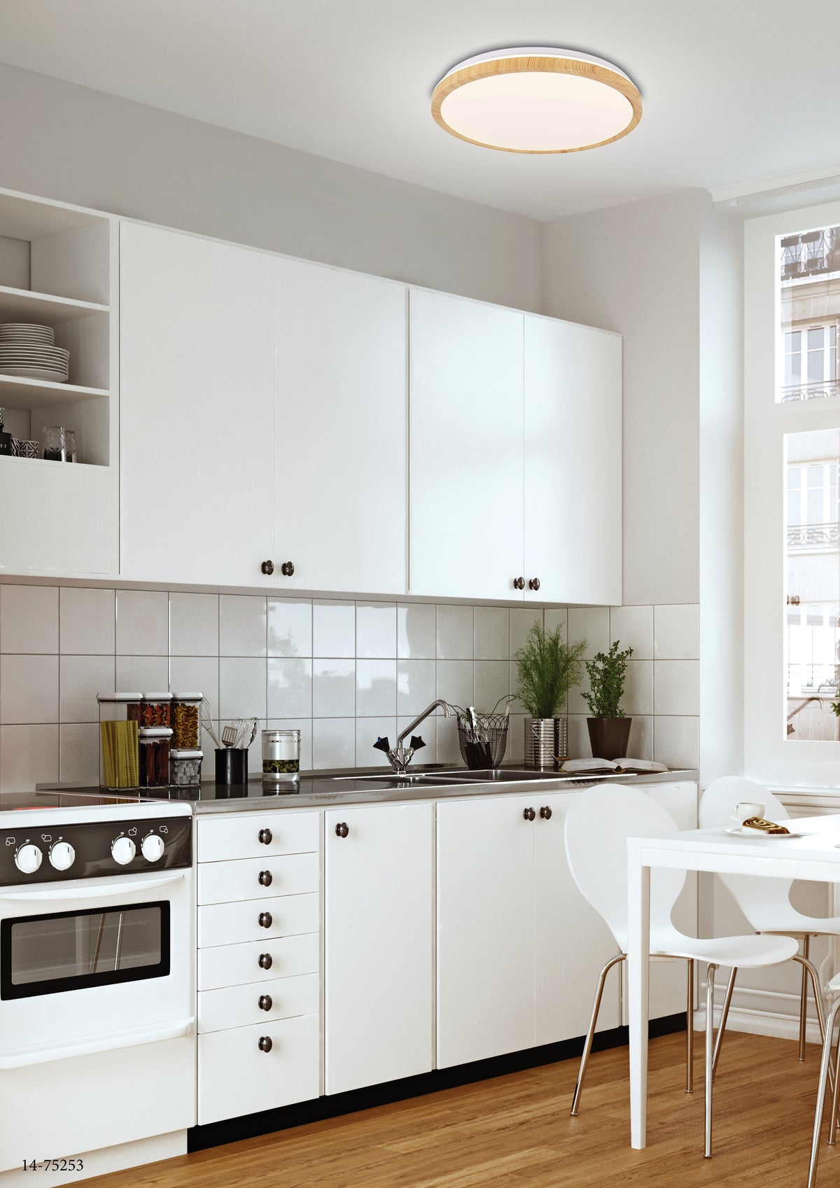 Plafonnier installé au plafond d'une cuisine blanche et moderne