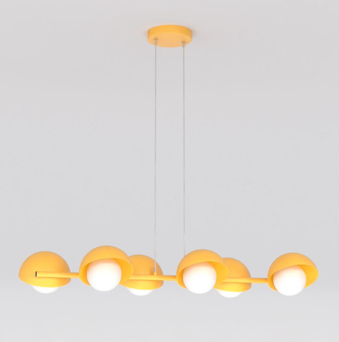 Vue de face du luminaire suspendu, barre horizontale et six demi-sphères orange avec diffuseurs opalins.