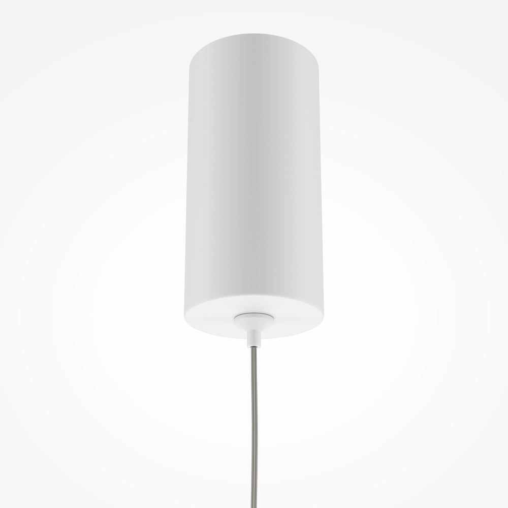 Vue rapprochée de la base cylindrique fixée au plafond avec câble