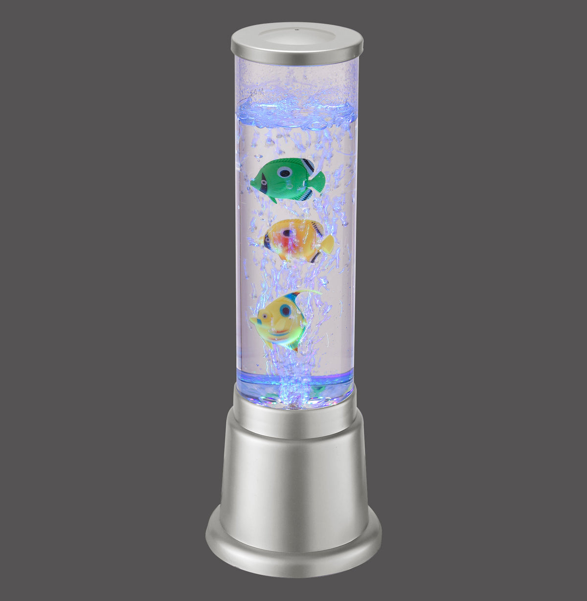 Lampe à poser cylindrique avec base argentée, tube d'eau, bulles et trois poissons colorés.
