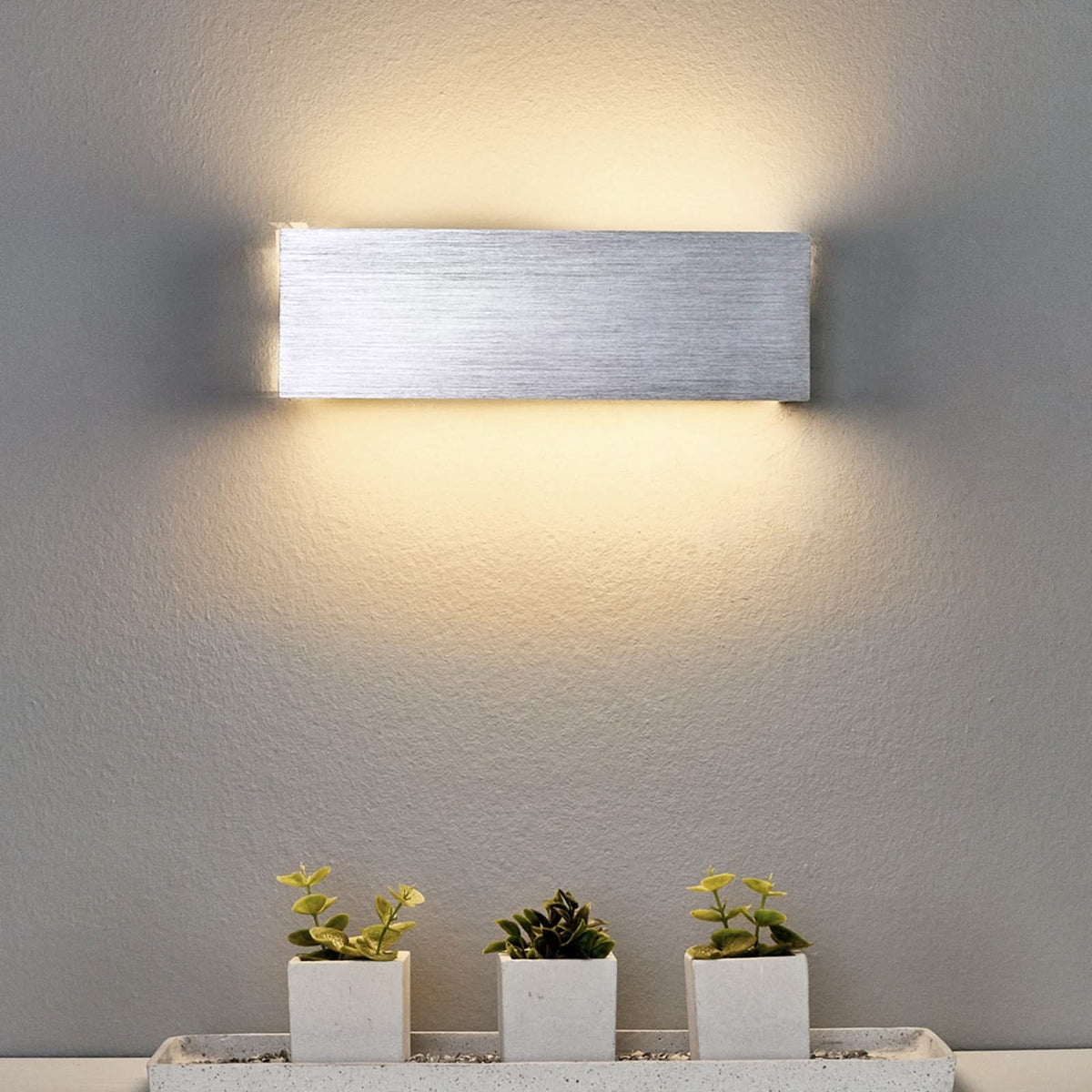 Applique murale LED Ranik en verre, hauteur 8 cm