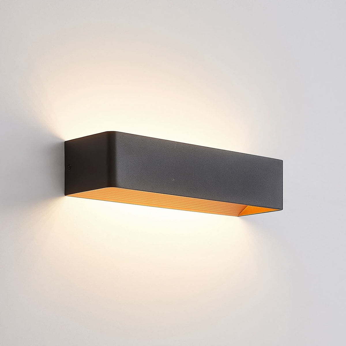 Applique murale LED Karam en aluminium, noir et doré, hauteur 8 cm, 3000 K, 11,2 W