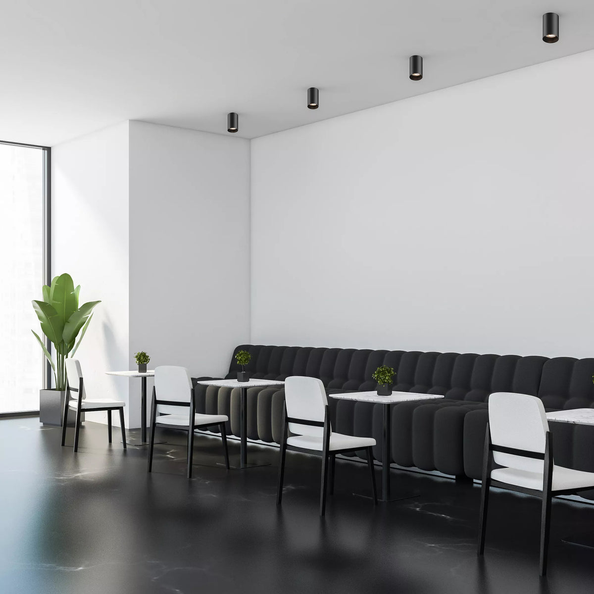Mise en ambiance de plusieurs spots noirs fixés au plafond d'un café contemporain.