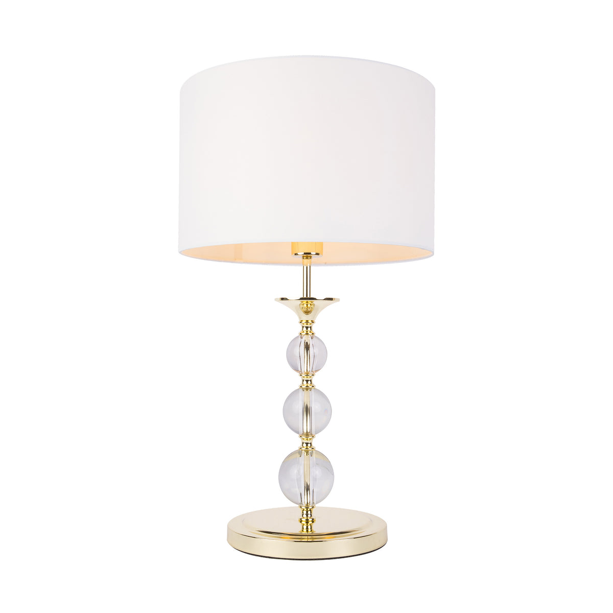 Lampe à poser de face avec abat-jour blanc et base dorée à trois boules de verre