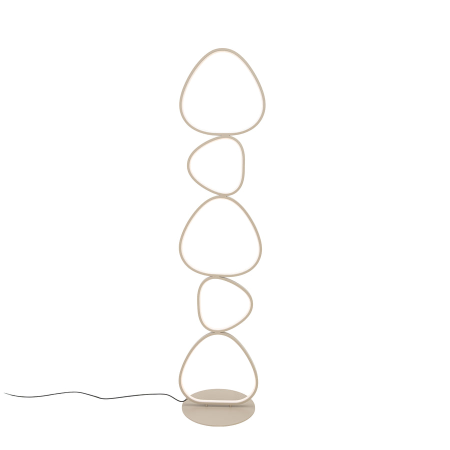 Lampadaire beige éteint, cinq anneaux lumineux empilés sur une base ronde.