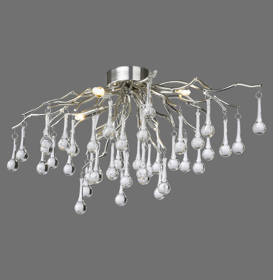 Luminaire plafonnier complet sur fond gris, branches métalliques et gouttes de verre suspendues.
