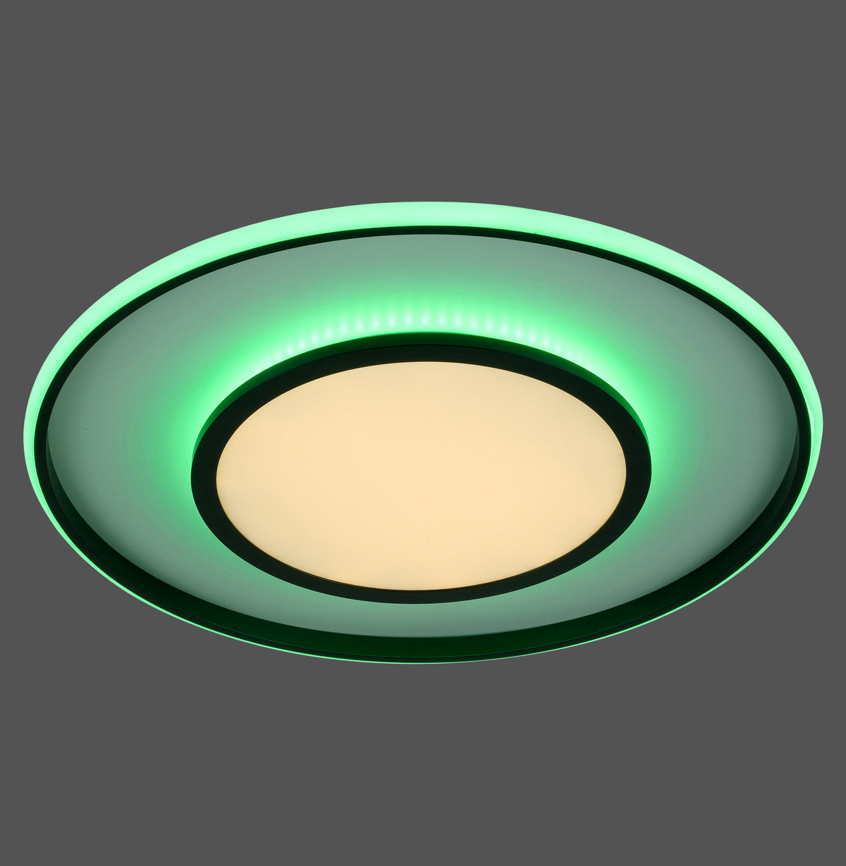 Vue de face du plafonnier rond noir, halo vert RGB allumé sur fond sombre