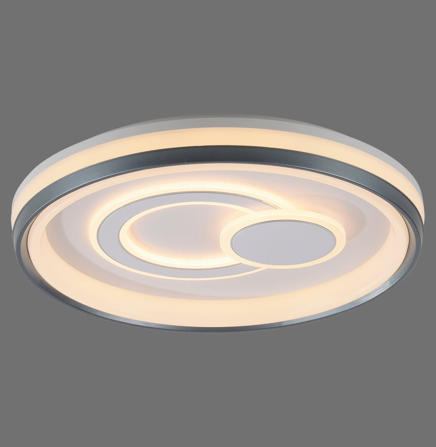 Plafonnier rond blanc vu de face sur fond gris, LED allumée