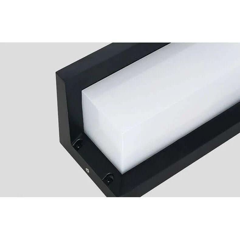 Gros plan sur le cadre aluminium noir et le diffuseur blanc opaque en angle