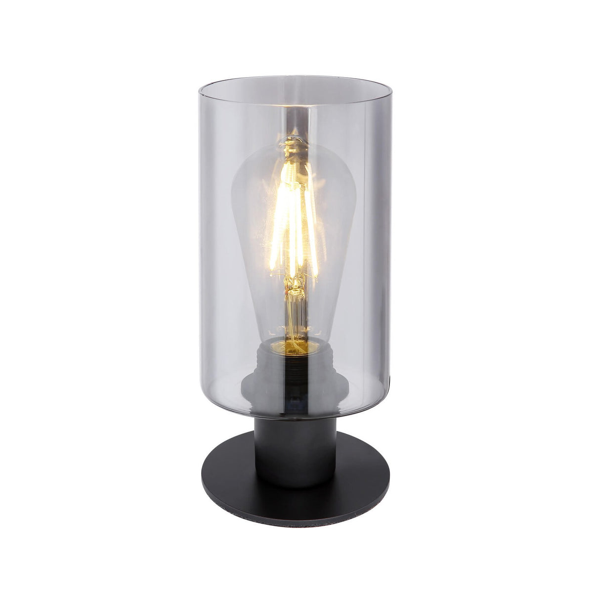 Vue de face de la lampe à poser noire avec abat-jour cylindrique en verre transparent.