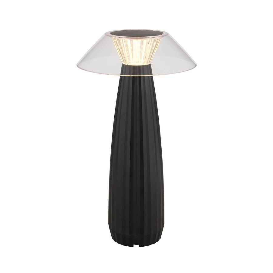 Lampe de face sur fond blanc, corps noir cannelé et abat-jour transparent conique