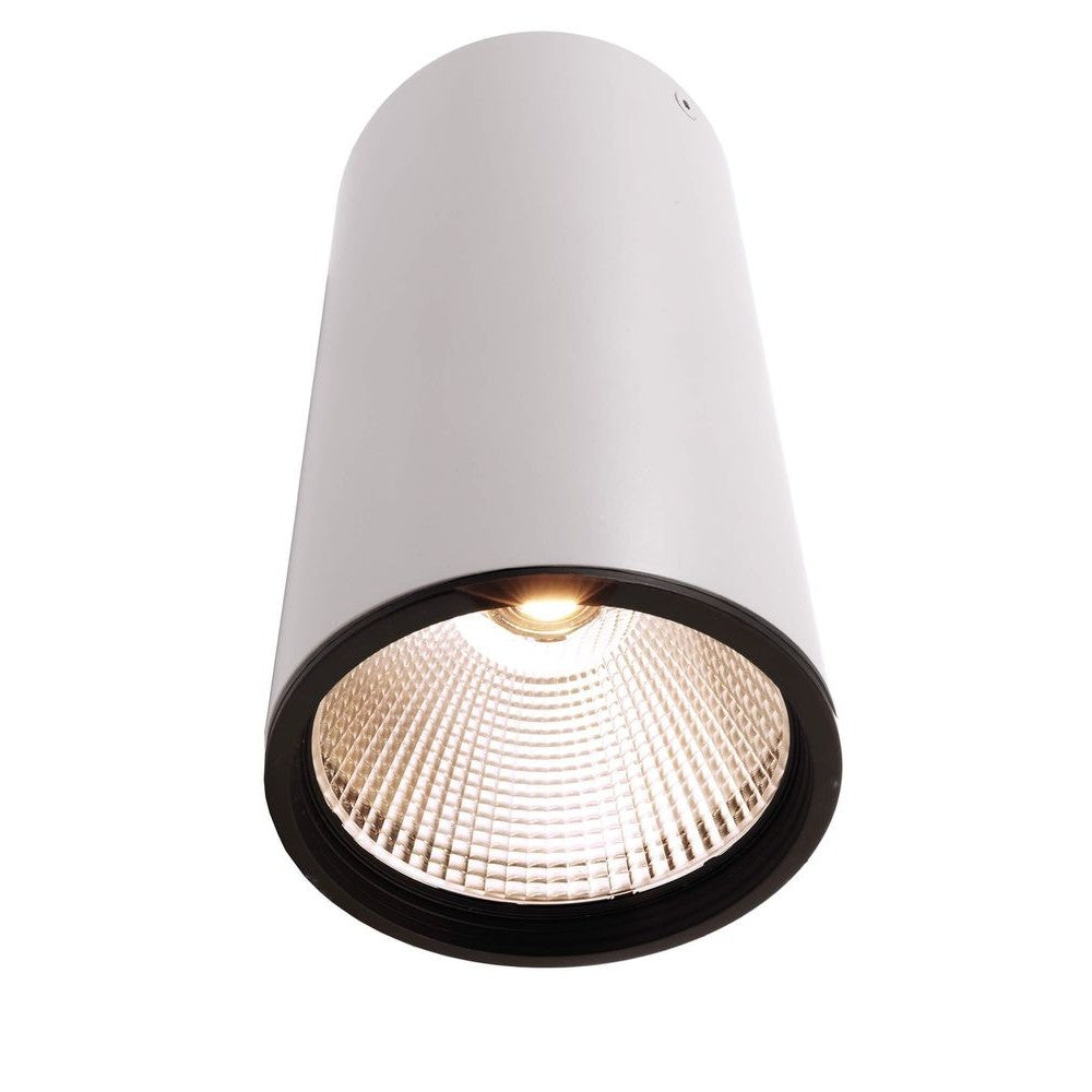 Spot cylindrique blanc vu de face, réflecteur strié et LED allumée