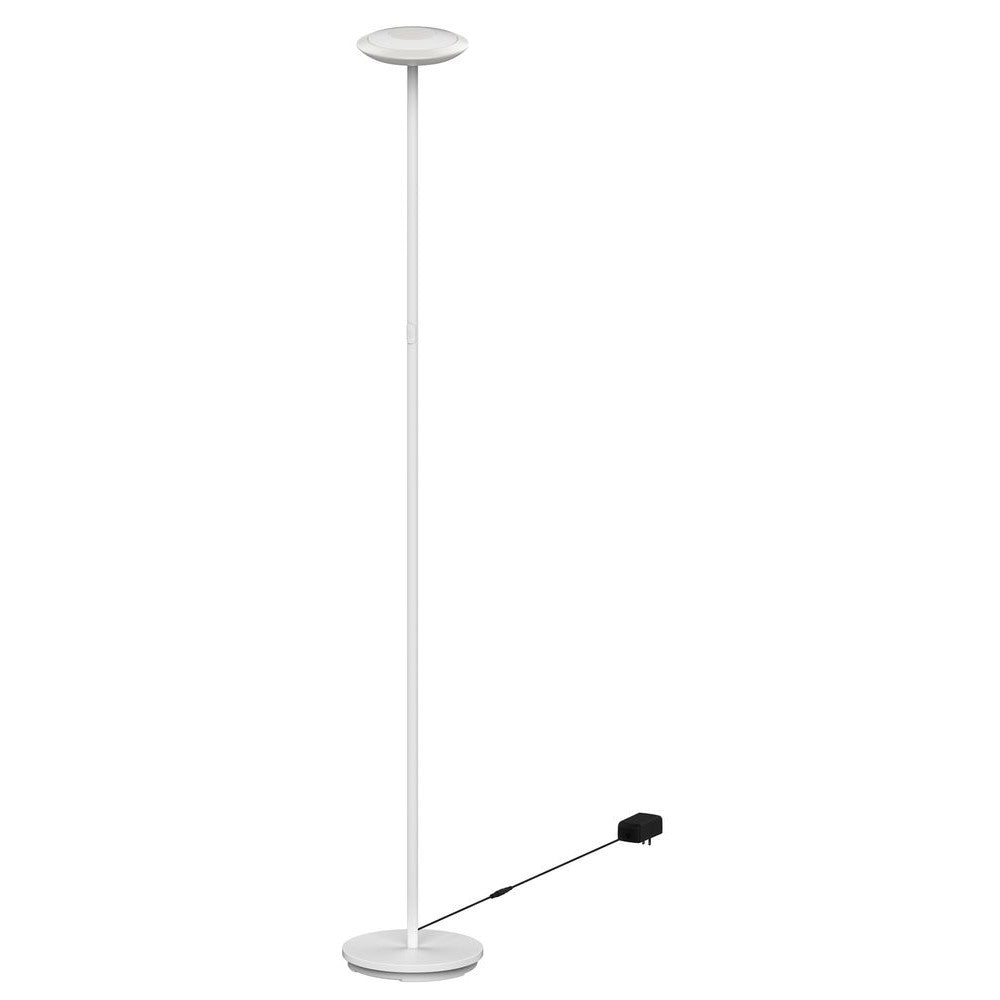 Lampadaire blanc fin sur fond blanc, diffuseur plat rond et base circulaire.