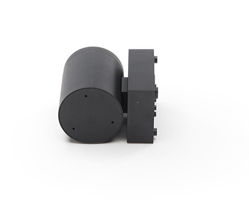 Vue arrière de l’applique montrant le capot cylindrique et la platine de fixation.