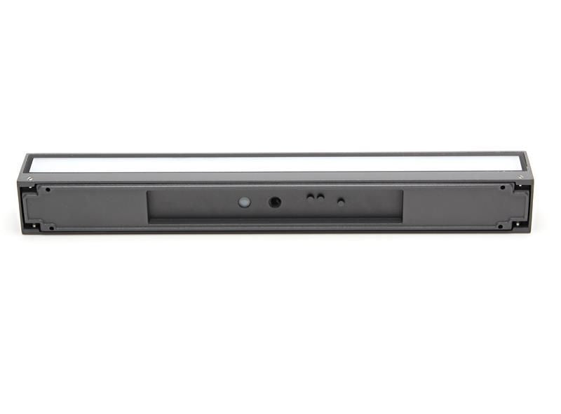 Vue arrière du luminaire montrant la platine de fixation, les trous et les connexions.