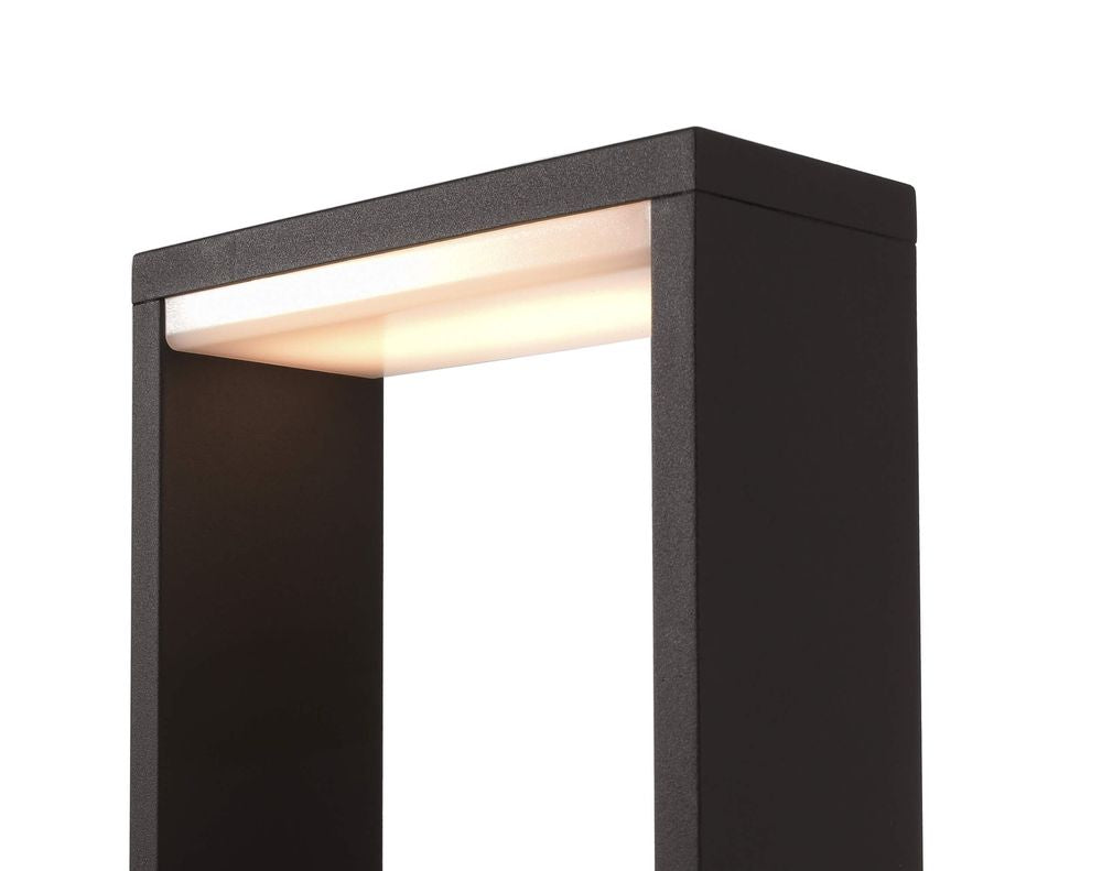 Détail du sommet avec diffuseur LED lumineux sous le capot anthracite texturé.