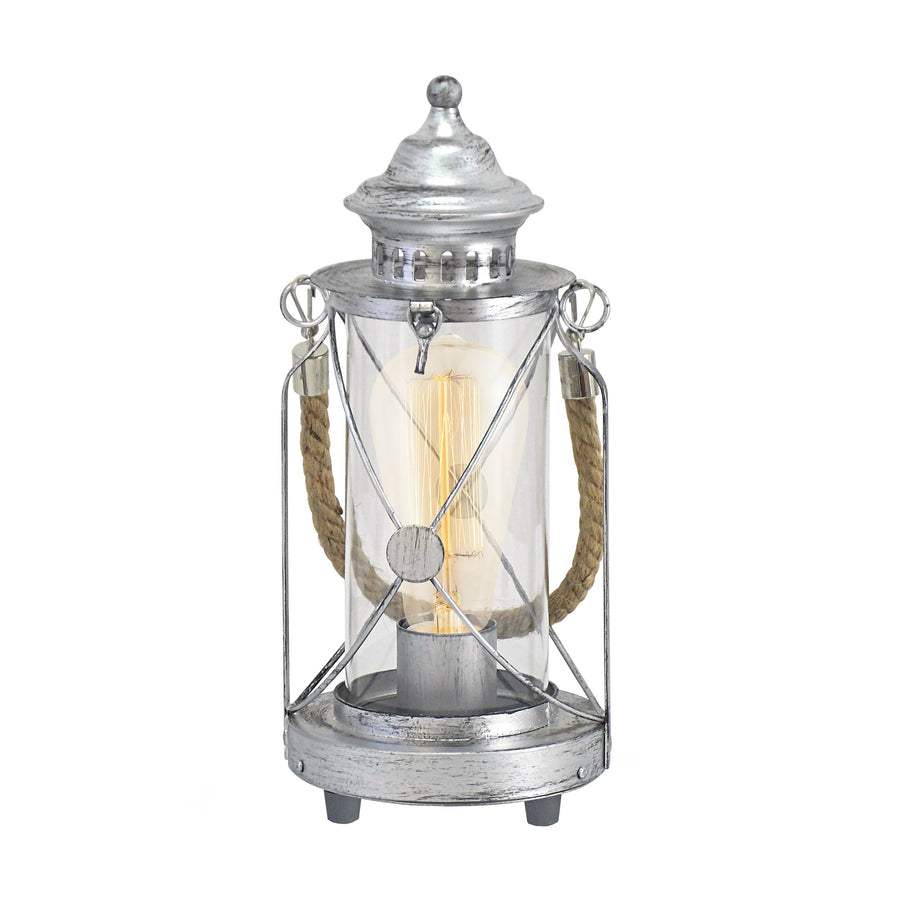 Vue légèrement inclinée de la lampe montrant la structure métallique et le verre cylindrique