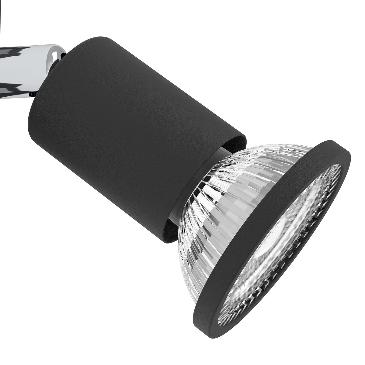 Gros plan sur la tête cylindrique noire et la lentille striée du projecteur