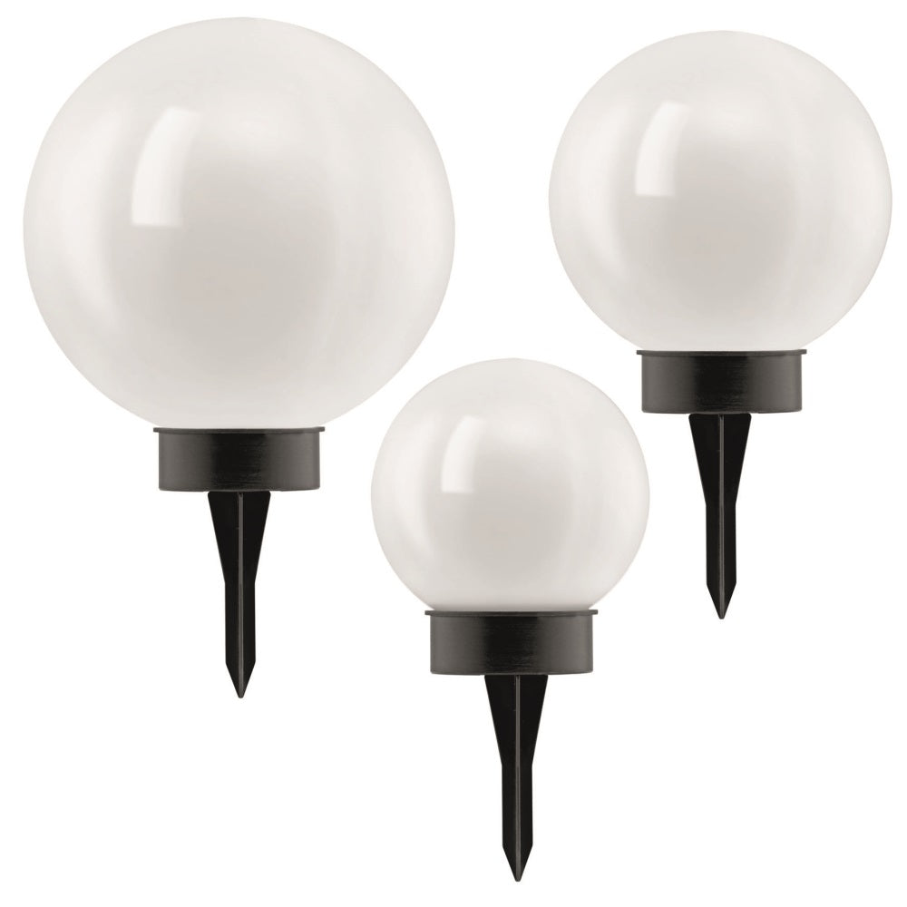 Trois globes blancs de tailles différentes sur piquets noirs, fond blanc