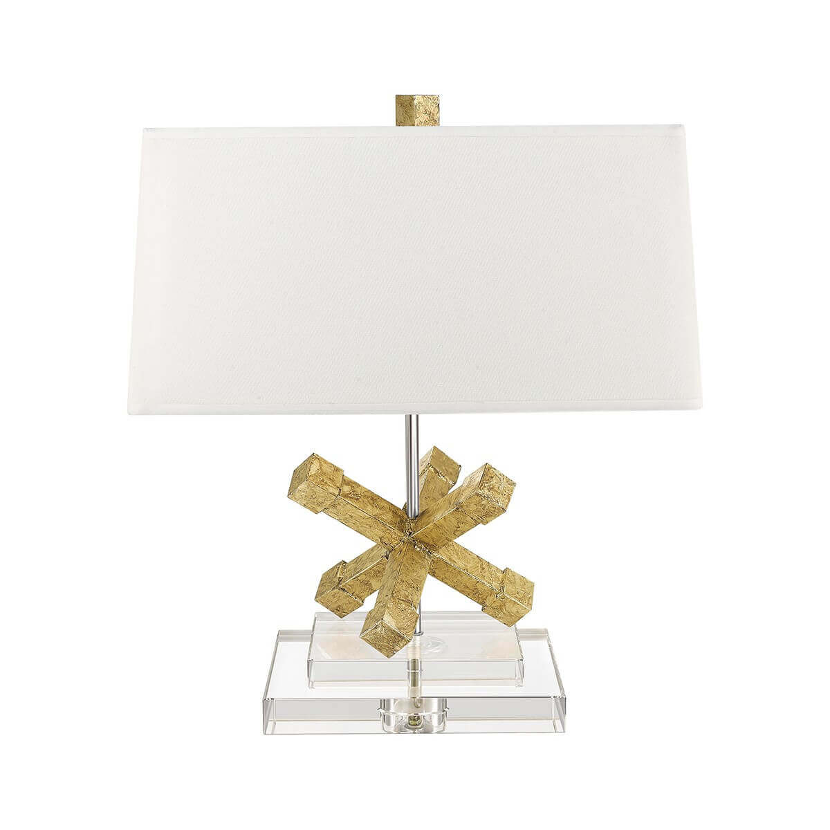 Lampe de face sur fond blanc, abat-jour rectangulaire crème et base dorée croisée