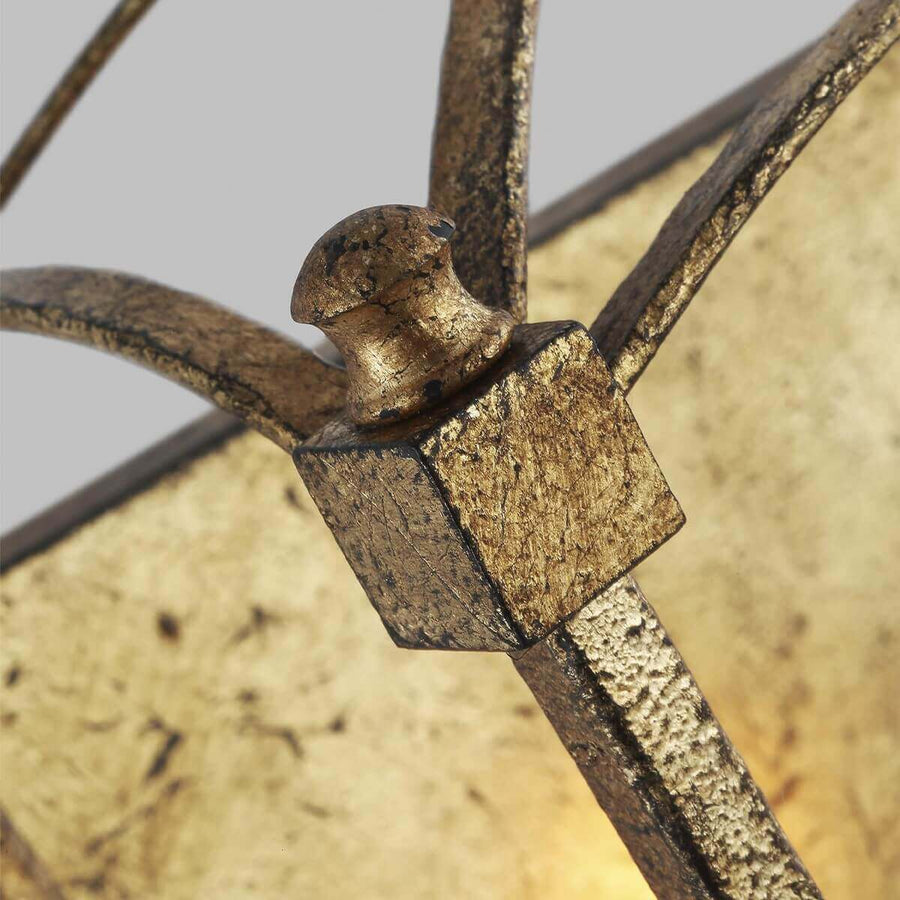 Gros plan sur le bouton de finition doré et l'assemblage cubique de la structure