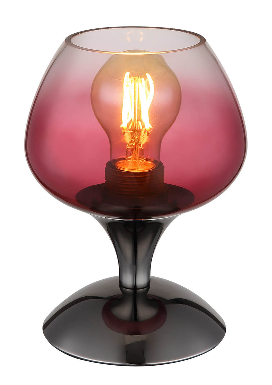 Vue rapprochée du globe en verre rose et de la base chromée noire