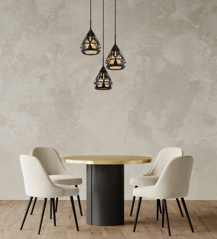 Suspension noire suspendue au-dessus d'une table ronde dans une salle à manger.