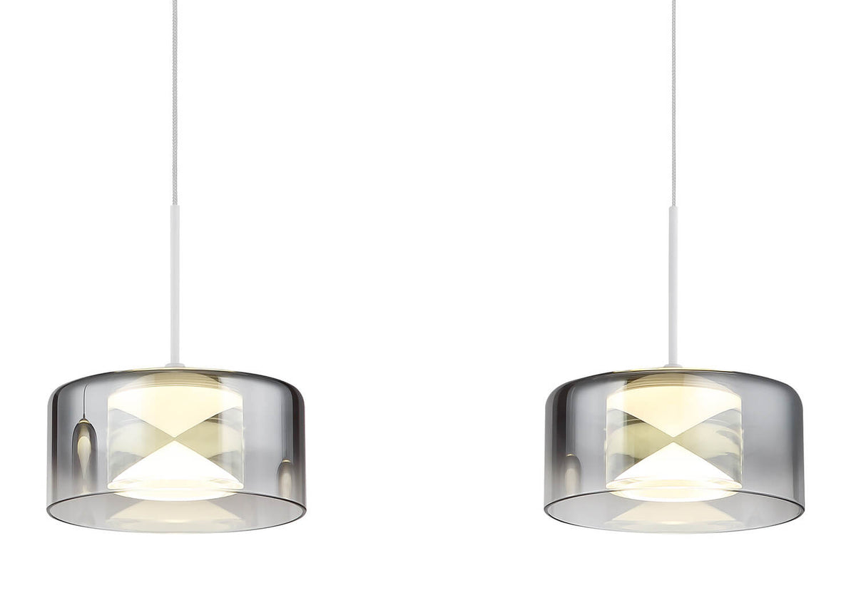 Gros plan sur deux diffuseurs en verre fumé et leur croix lumineuse interne.