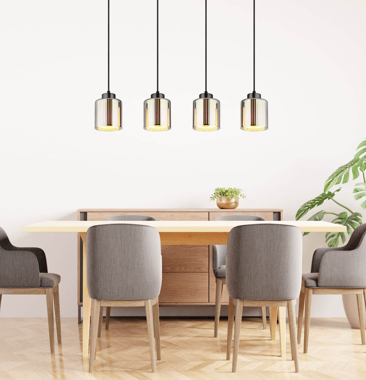 Mise en ambiance du luminaire au-dessus d'une table à manger en bois clair