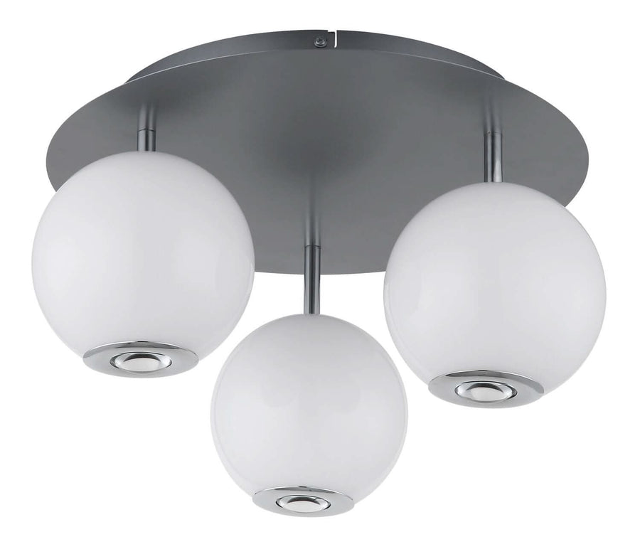Vue de dessous montrant les trois diffuseurs sphériques et la platine circulaire grise