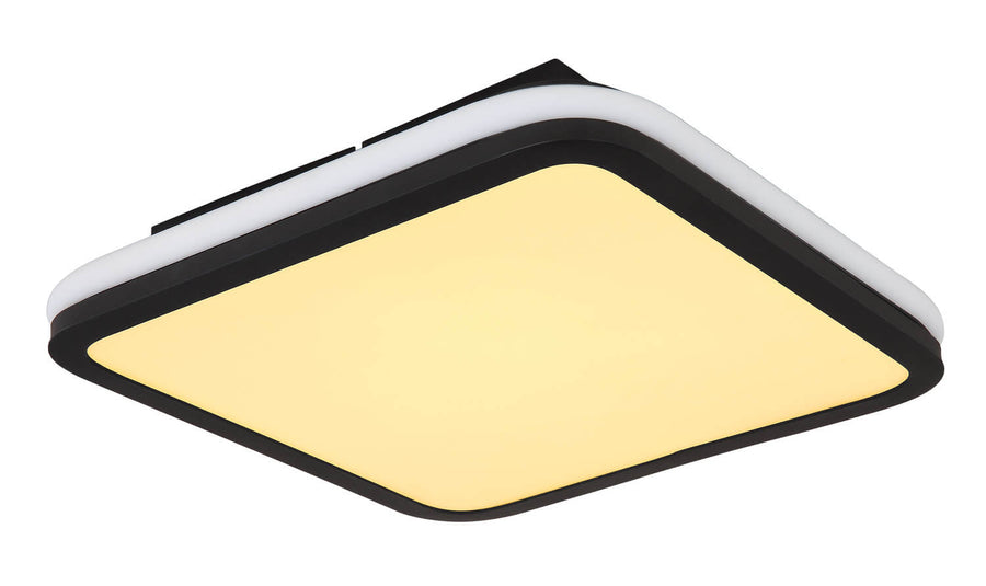 Vue en biais allumée, diffuseur jaune chaud et contour noir mat