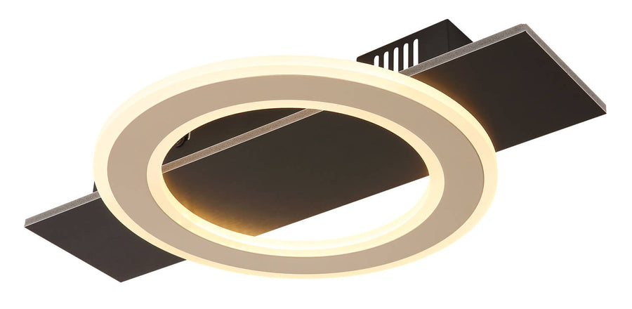 Gros plan sur l'anneau lumineux et la platine rectangulaire noire du luminaire.