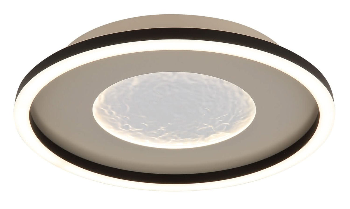 Gros plan du diffuseur central en verre texturé, lumière allumée, cerclage noir marqué.